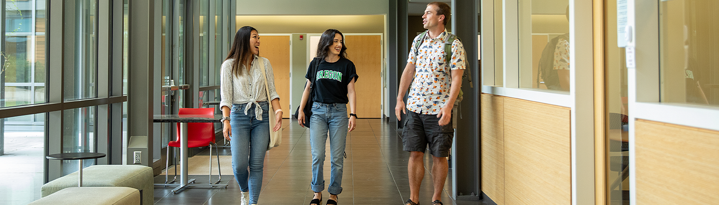 students walking down a hallway in HEDCO